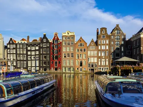 Canal houses and boats in Amsterdam
