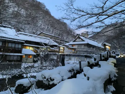 Snow-covered wooden houses in Takayama