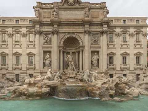 The Trevi Fountain in Rome with its turquoise basin.